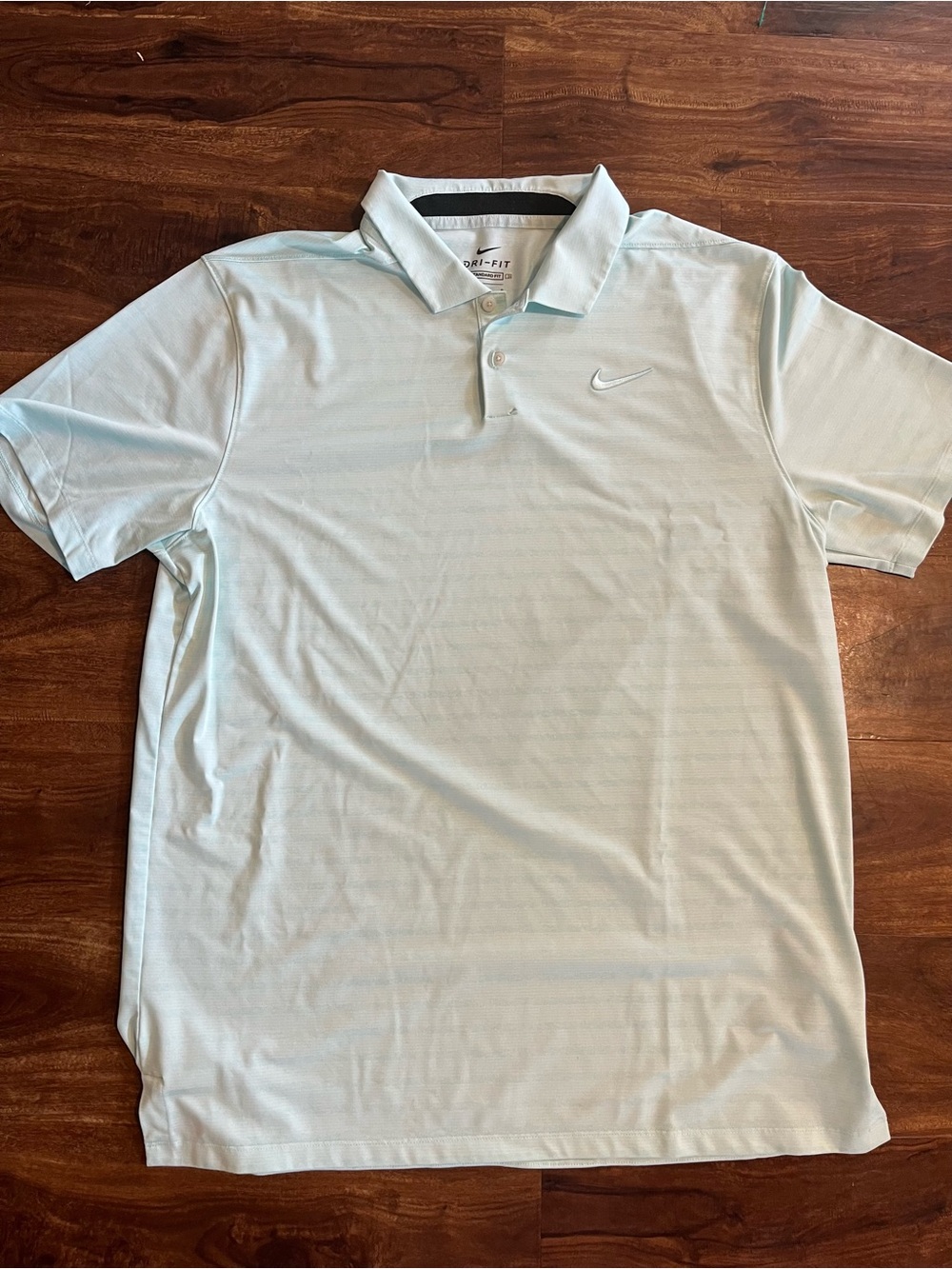 Nike Polo Shirt in Pale Blue with Embroidered Swoosh